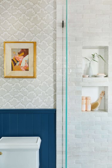 modern shower idea with niches and blue wainscoting