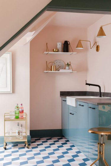 pink and blue kitchen floor tile with pink walls and blue cabinets