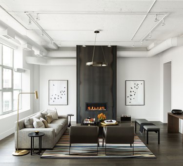 modern living room with hot rolled steel front fireplace