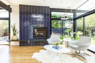 midcentury fireplace with blue fireplace surround