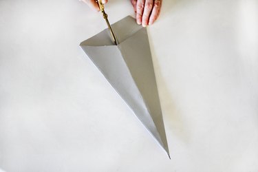 Cutting slit in center of cone shape