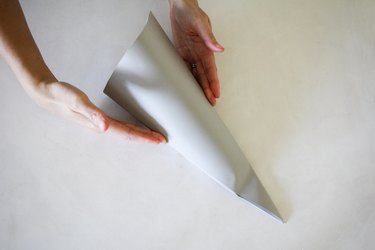 Puffing paper shape into three dimensional cone