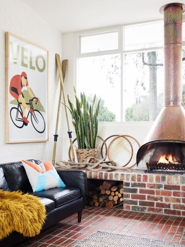 midcentury fireplace with brick hearth