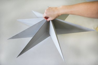 Taping Scandinavian Christmas star together