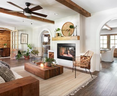 modern farmhouse mantel decorating idea in the living room with wood beams
