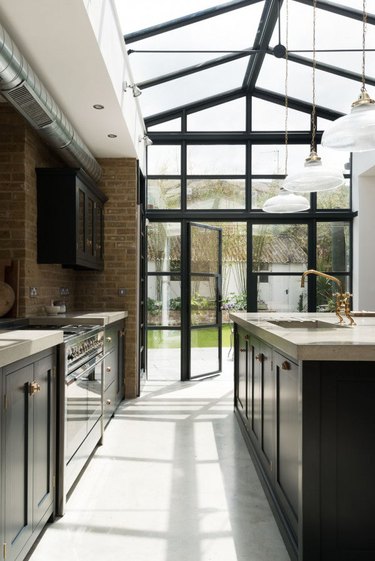 lage open kitchen with greenhouse style ceiling