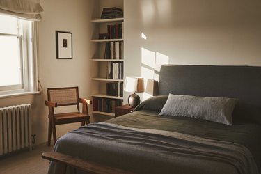 moody bedroom with slate bedding