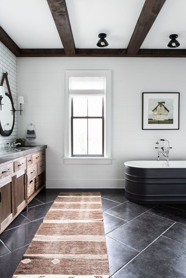 attic bathroom ideas with white walls and black floor