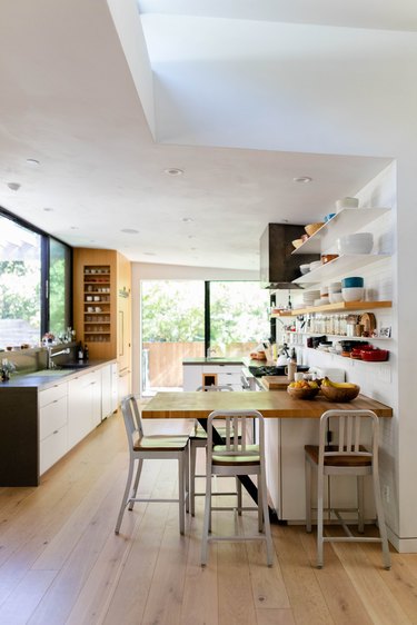 kitchen with wood butcher block countertops and hardwood floors