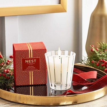 Nest holiday candle on tray