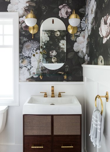 half bathroom idea with large scale floral wallpaper