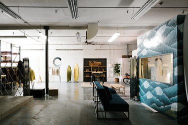 industrial workspace with mural and concrete flooring