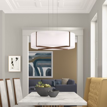 Scandinavian style drum lighting for dining room with wood detail from Perigold