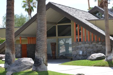 a-frame home with stone facade