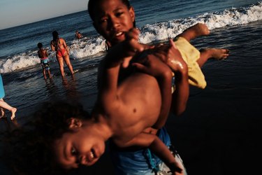 kids playing at the beach
