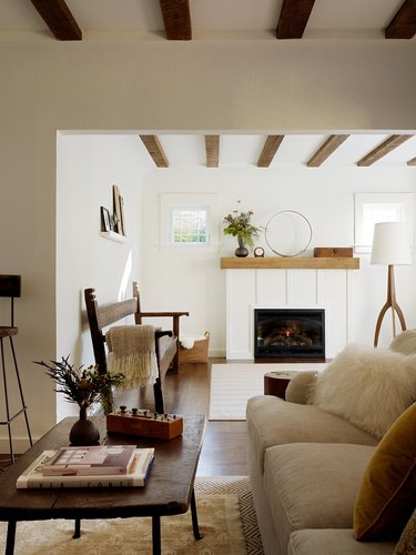 rustic living room idea with exposed ceiling beams