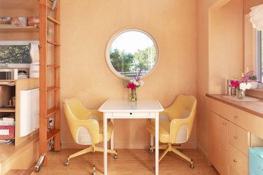 office space with peach walls and brown floors