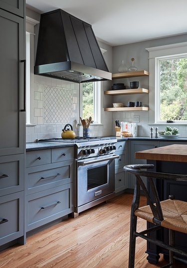 Craftsman kitchen with grayish blue cabinets and tile backsplash