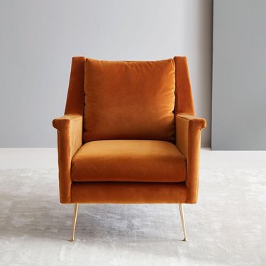 orange velvet midcentury lounge chair from West Elm
