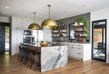 Waterfall Countertop in Kitchen by Dichotomy Interiors