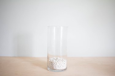 Gravel added to vase