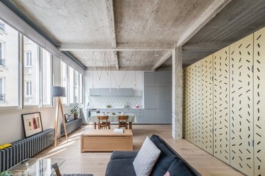 living room with cement ceilings
