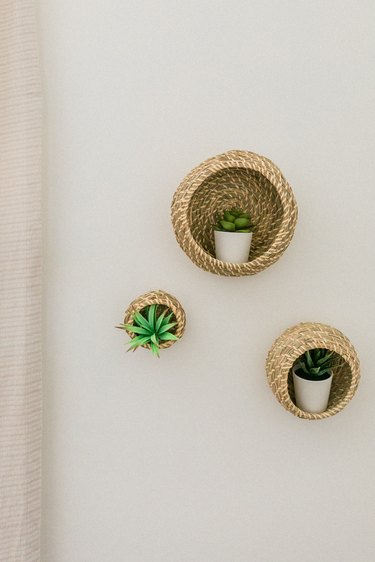 We love the boho-inspired natural texture of these plant basket shelves.