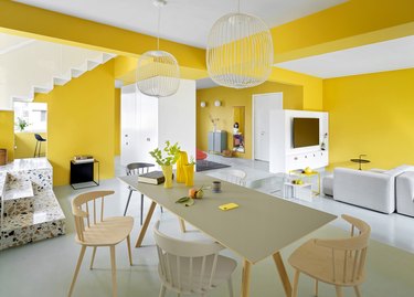 yellow open concept living room