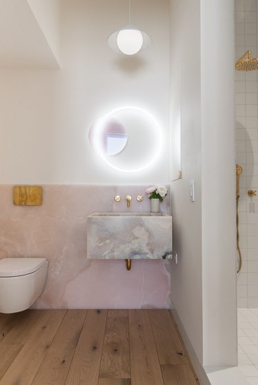 rose pink onyx sink in white and pink bathroom