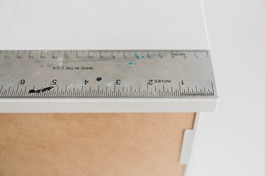 Use a ruler to draw marks every 1 inch.