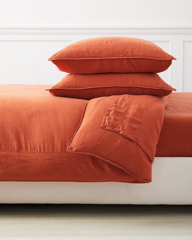 Serena & Lily terracotta linen duvet cover and pillows