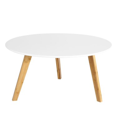 Round white mid-century coffee table with wooden legs