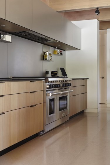 minimalist kitchen with black countertops