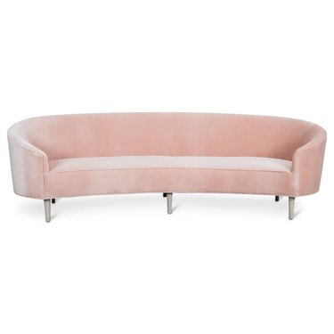 Velvet curved mid-century sofa in light pink