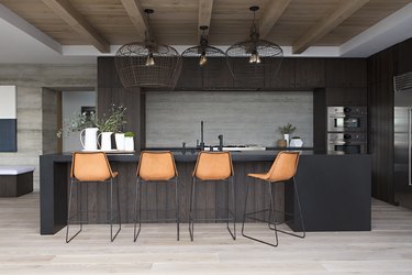 minimalist and modern kitchen with black countertops