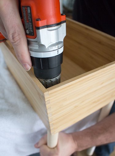 Attaching dowel to box