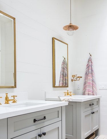 pendant lighting bathroom idea for white bathroom with gray vanities