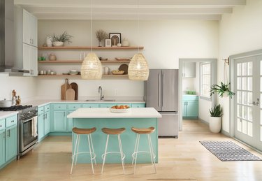 kitchen space with gray and light blue cabinets