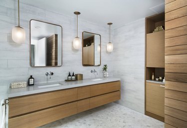 pendant lighting bathroom idea for gray bathroom with wooden vanity and shelves