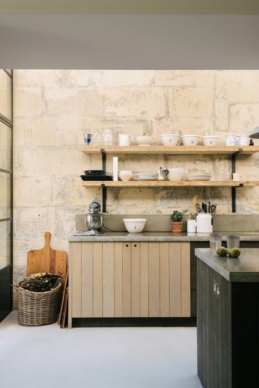 Kitchen with stone tile backsplash