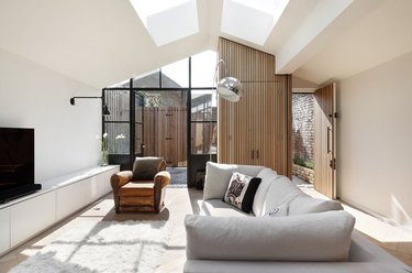 a previous wood shed becomes chic, modern London home