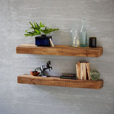 Reclaimed wood floating shelves in medium finish