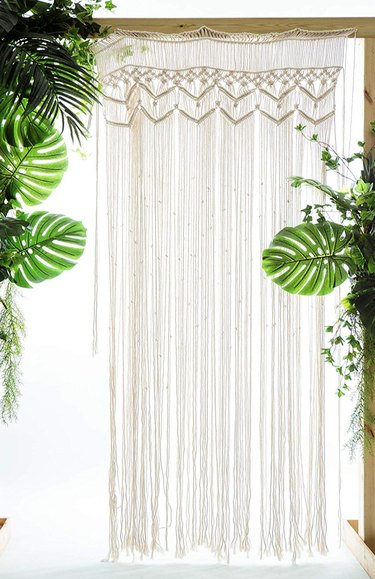 Macrame curtain in white.