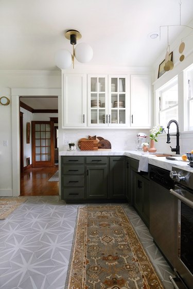 Starburst-shape tile modern kitchen flooring in gray with black cabinets