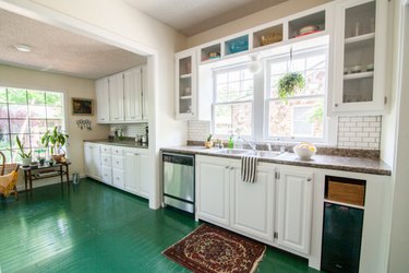 Painted green wood modern kitchen flooring in white kitchen