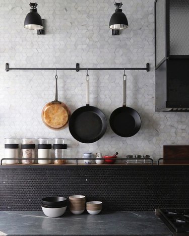 gray kitchen with black countertops