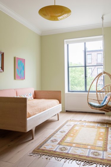 Scandinavian colors with yellow walls and orange accents