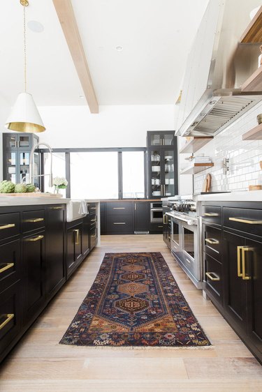 farmhouse-style kitchen with black island