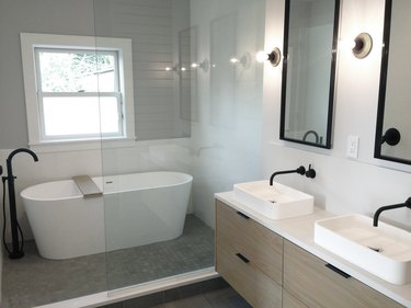 modern bathroom with rectangle mirrors over double vanity
