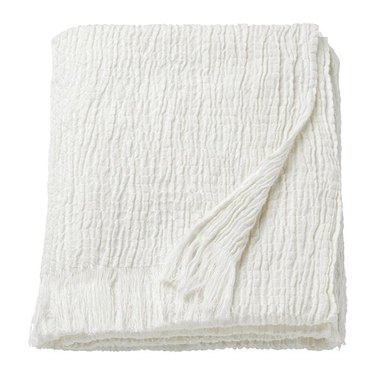 organic cotton waffle throw blanket in that is a decorative accent